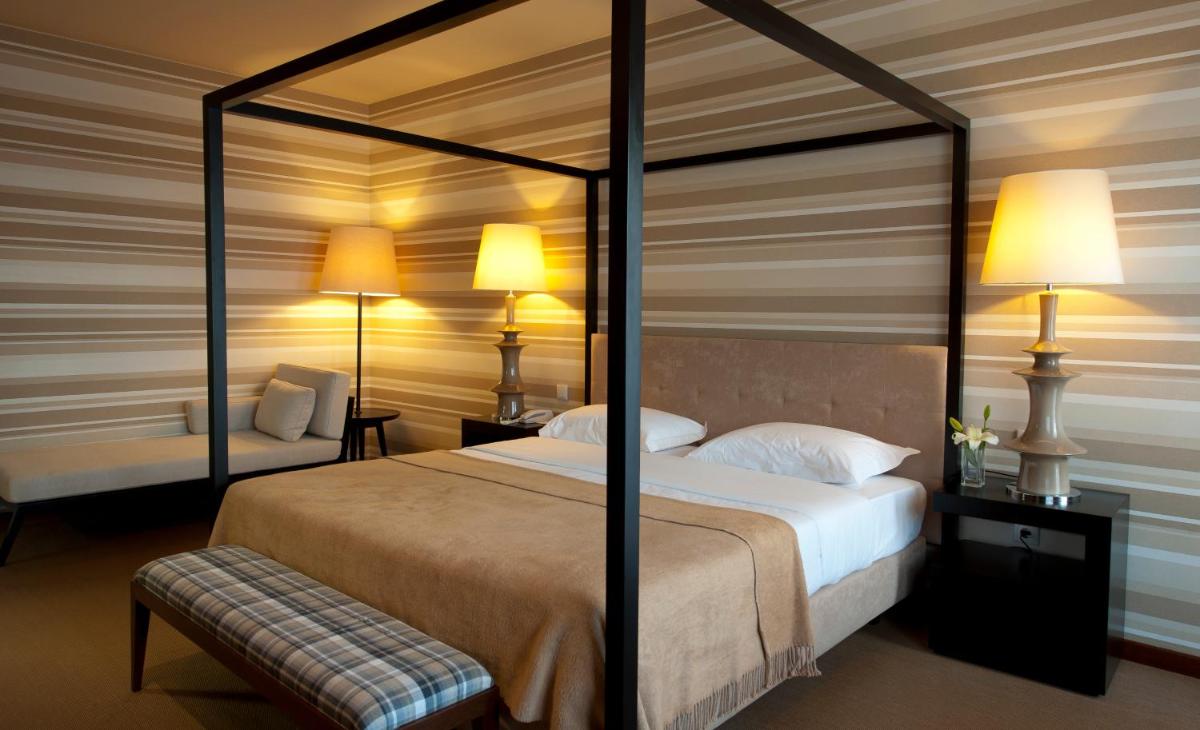 Uma cama ou camas num quarto em Grande Hotel De Luso