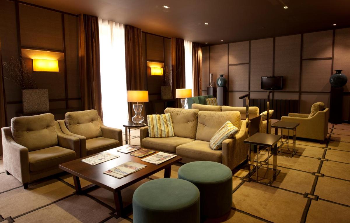 Uma área de estar em Grande Hotel De Luso