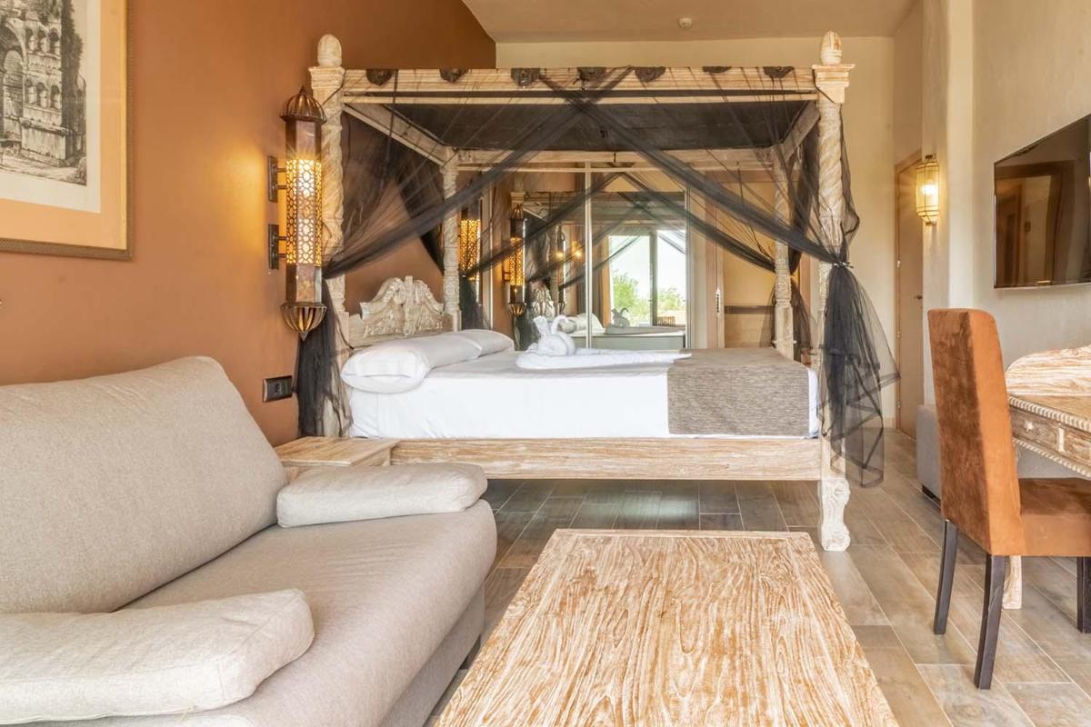 Cama o camas de una habitación en El Cortijo de Zahara by QHotels