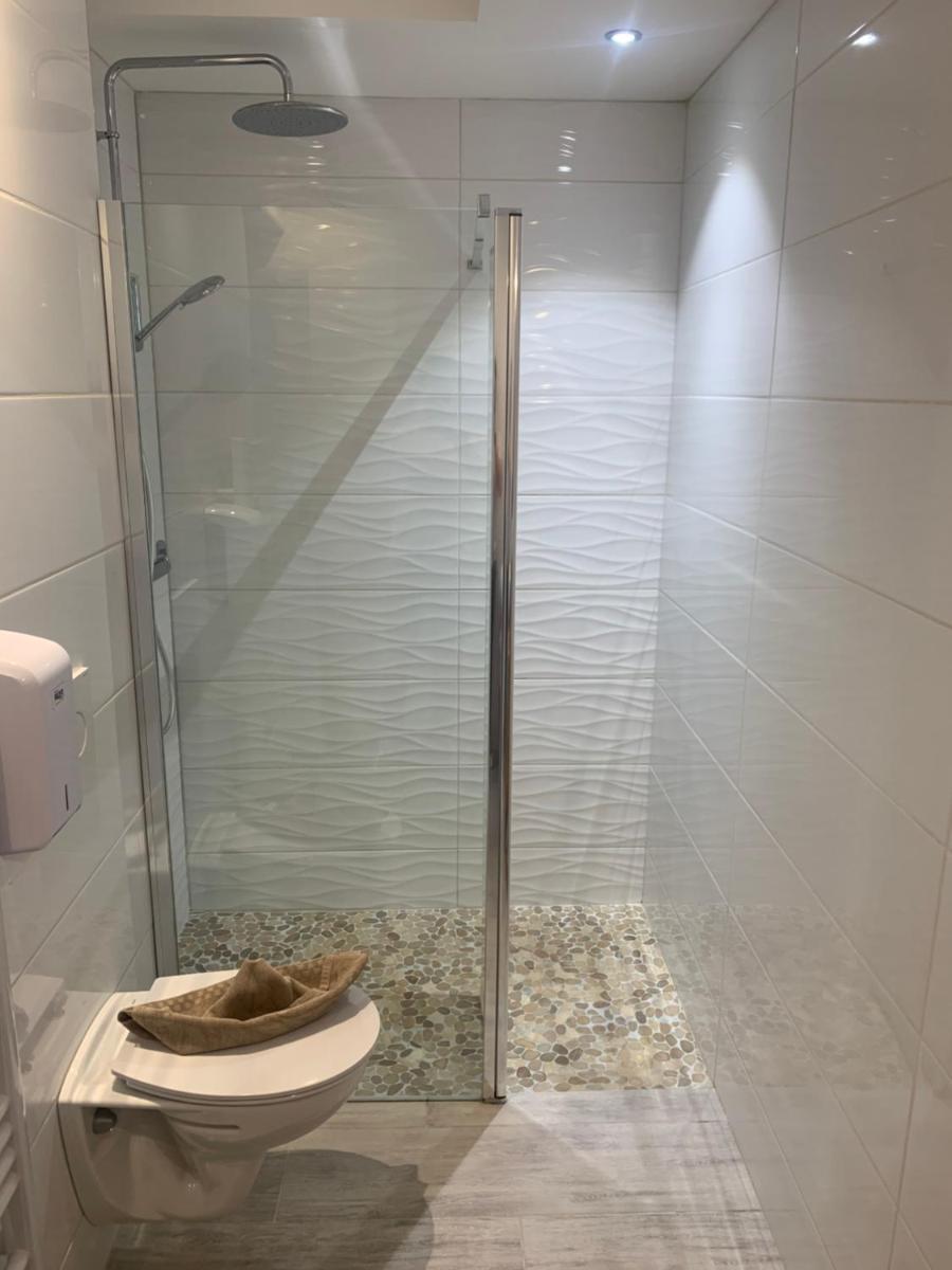 Salle de bains dans l'établissement Hôtel Beau Soleil