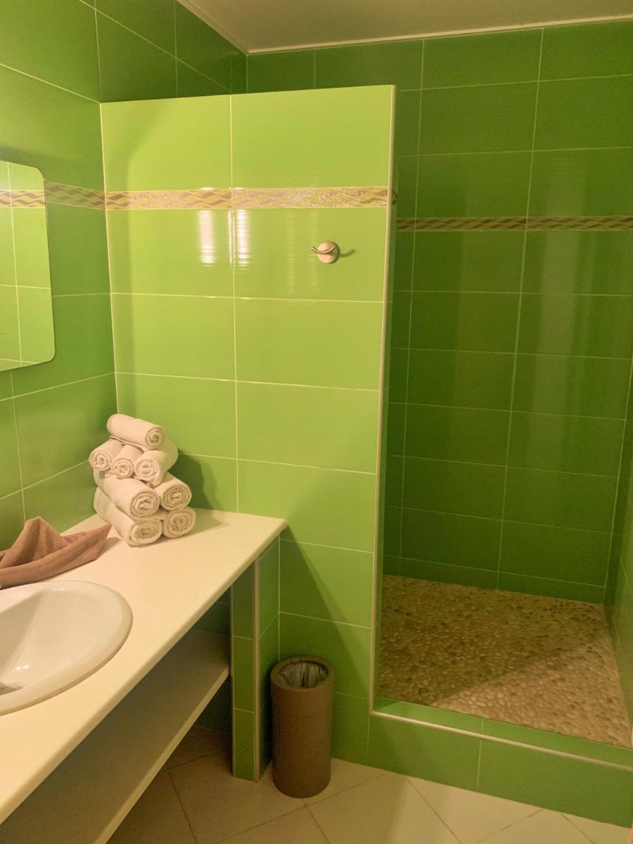 Salle de bains dans l'établissement Hôtel Beau Soleil