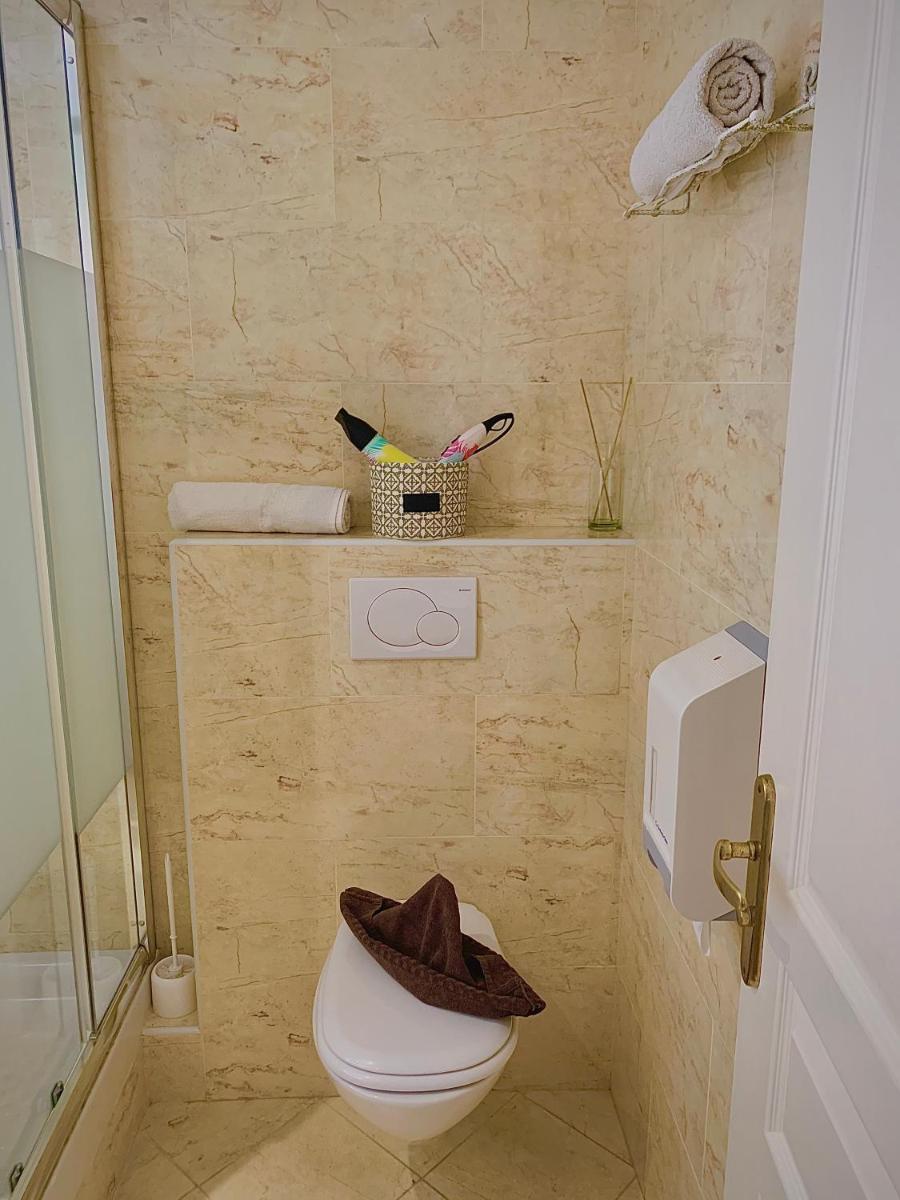 Salle de bains dans l'établissement Hôtel Beau Soleil