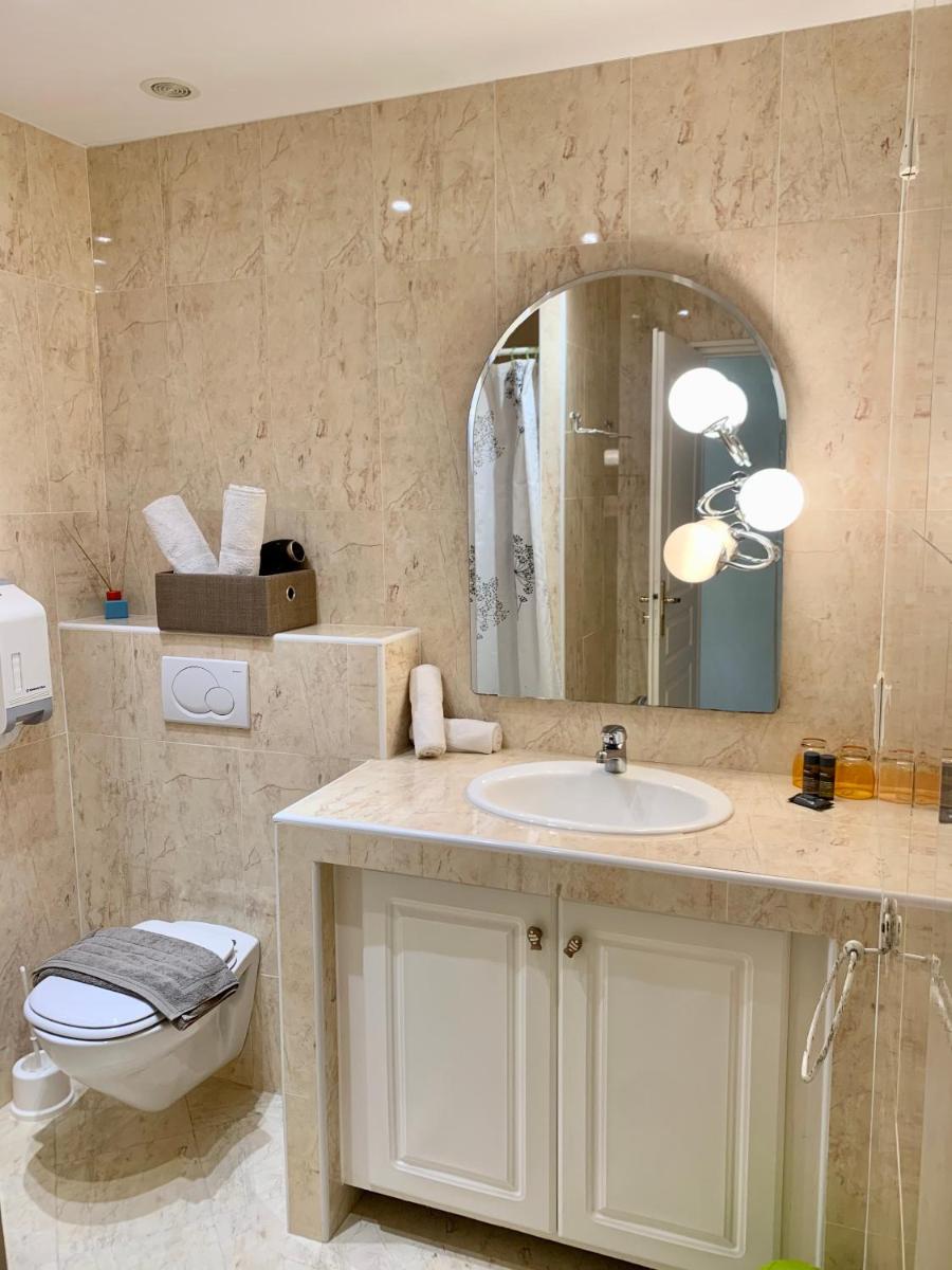 Salle de bains dans l'établissement Hôtel Beau Soleil