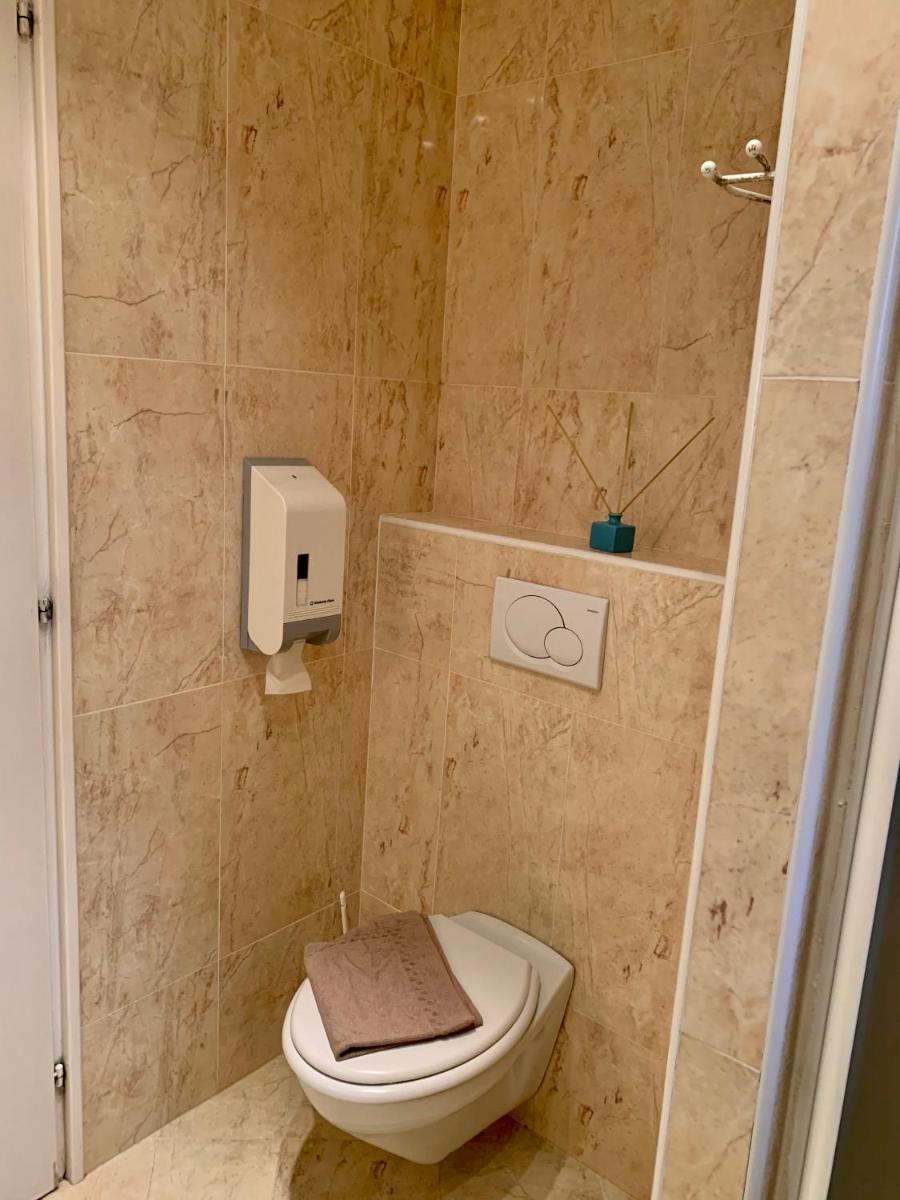 Salle de bains dans l'établissement Hôtel Beau Soleil