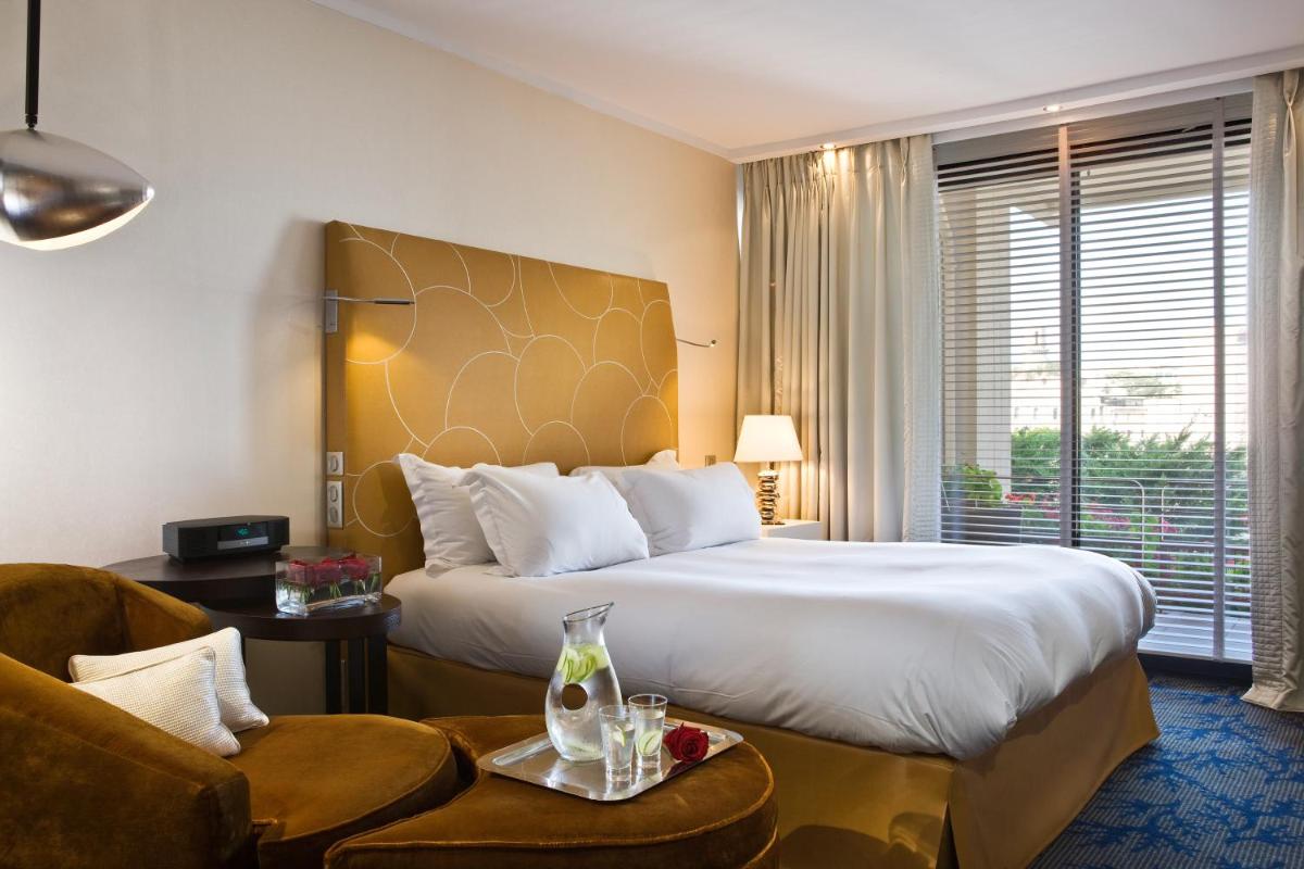 Un ou plusieurs lits dans un hébergement de l'établissement Sofitel Marseille Vieux-Port