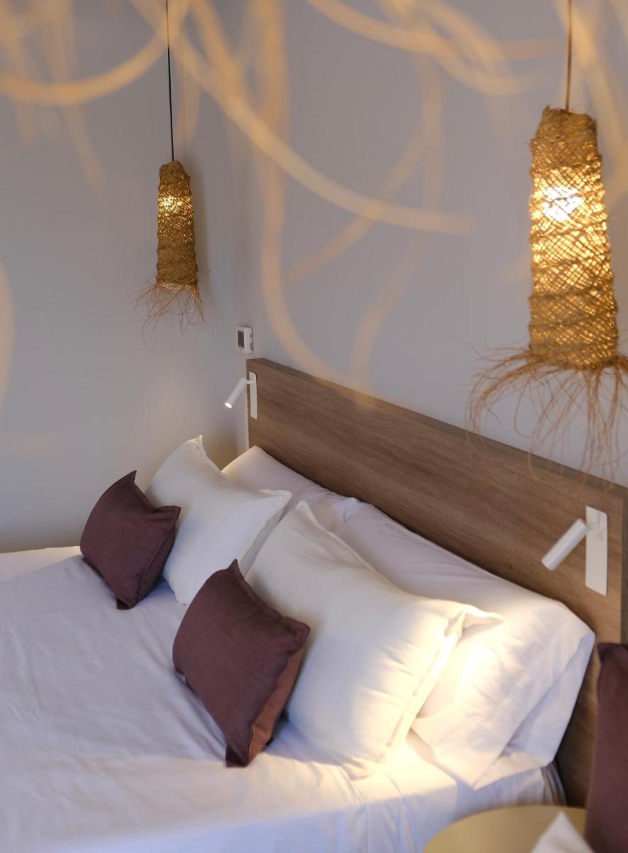 Cama o camas de una habitación en Eques Petit Resort