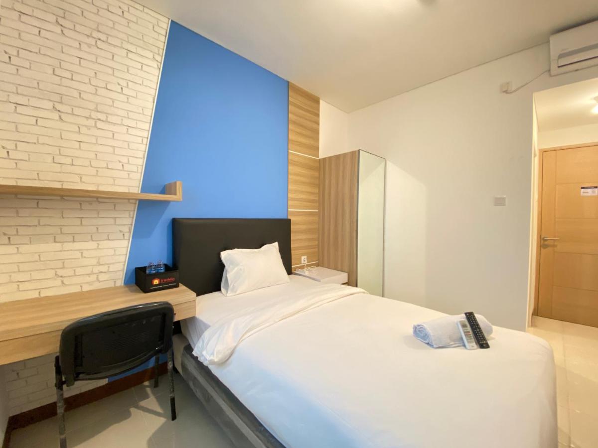 Smart Studio Room Semi Apartment at The Lodge Paskal near BINUS University By Travelio - Housity