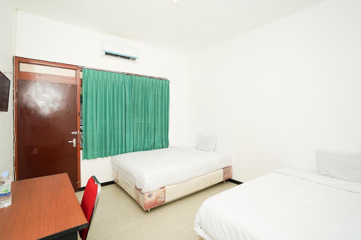 Suitetrails - Merapi Inn Surabaya by ecommerceloka