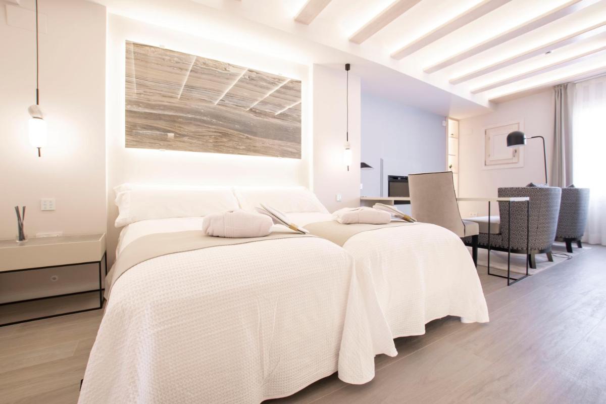 Cama o camas de una habitación en Hotel 1877 Sensaciones & SPA ADULTS ONLY
