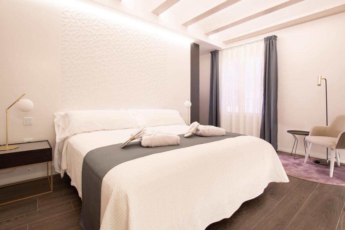 Cama o camas de una habitación en Hotel 1877 Sensaciones & SPA ADULTS ONLY
