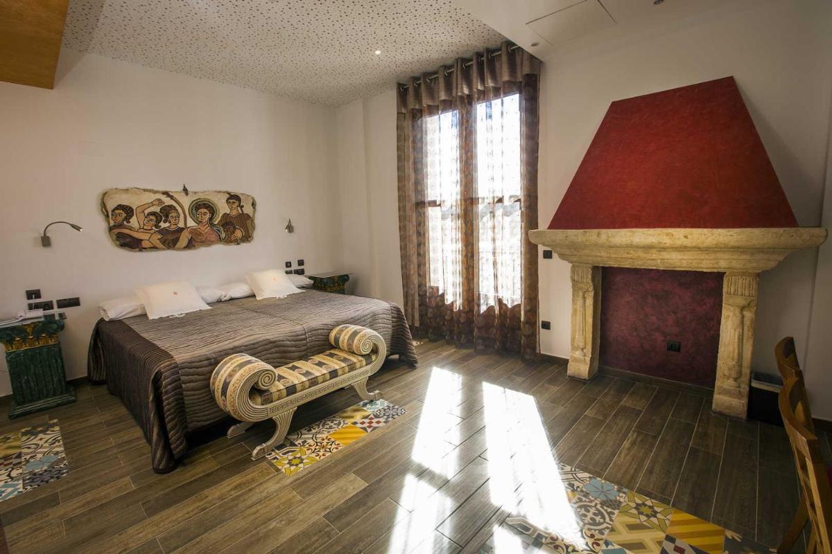 Cama o camas de una habitación en Hotel SPA El Lagar de Isilla