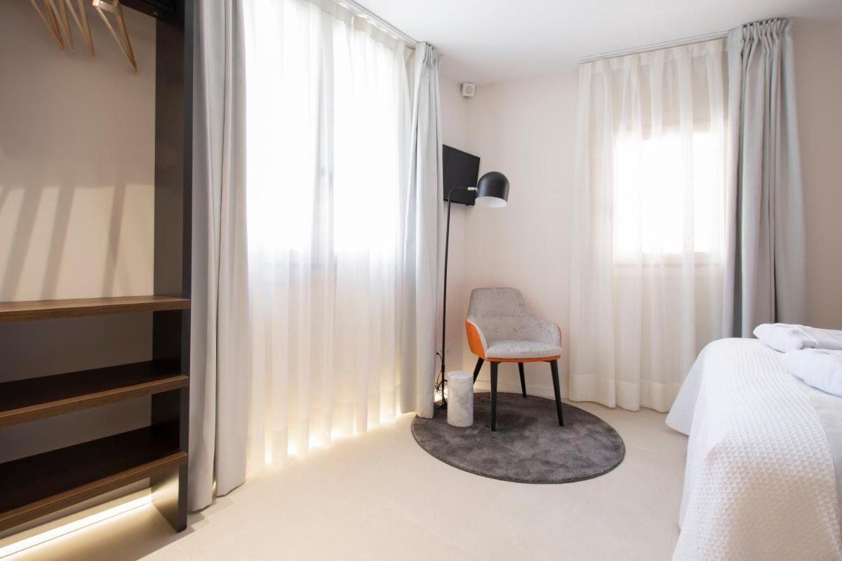 Cama o camas de una habitación en Hotel 1877 Sensaciones & SPA ADULTS ONLY
