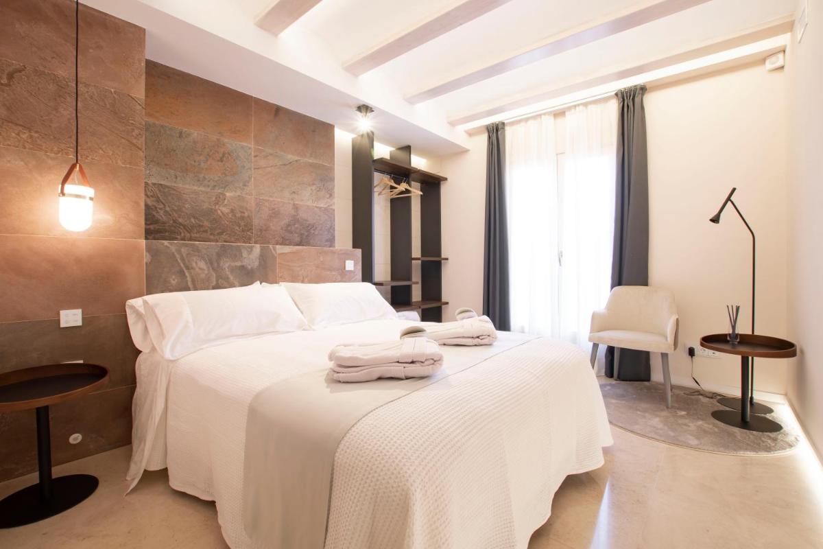 Cama o camas de una habitación en Hotel 1877 Sensaciones & SPA ADULTS ONLY
