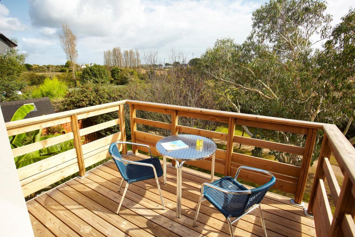 Balcon ou terrasse dans l'établissement Carnac Lodge Hotel & Spa