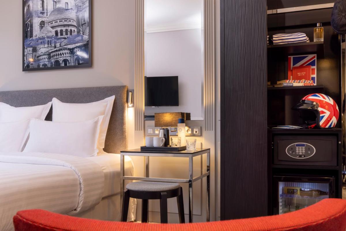 Un ou plusieurs lits dans un hébergement de l'établissement Les Matins de Paris & Spa