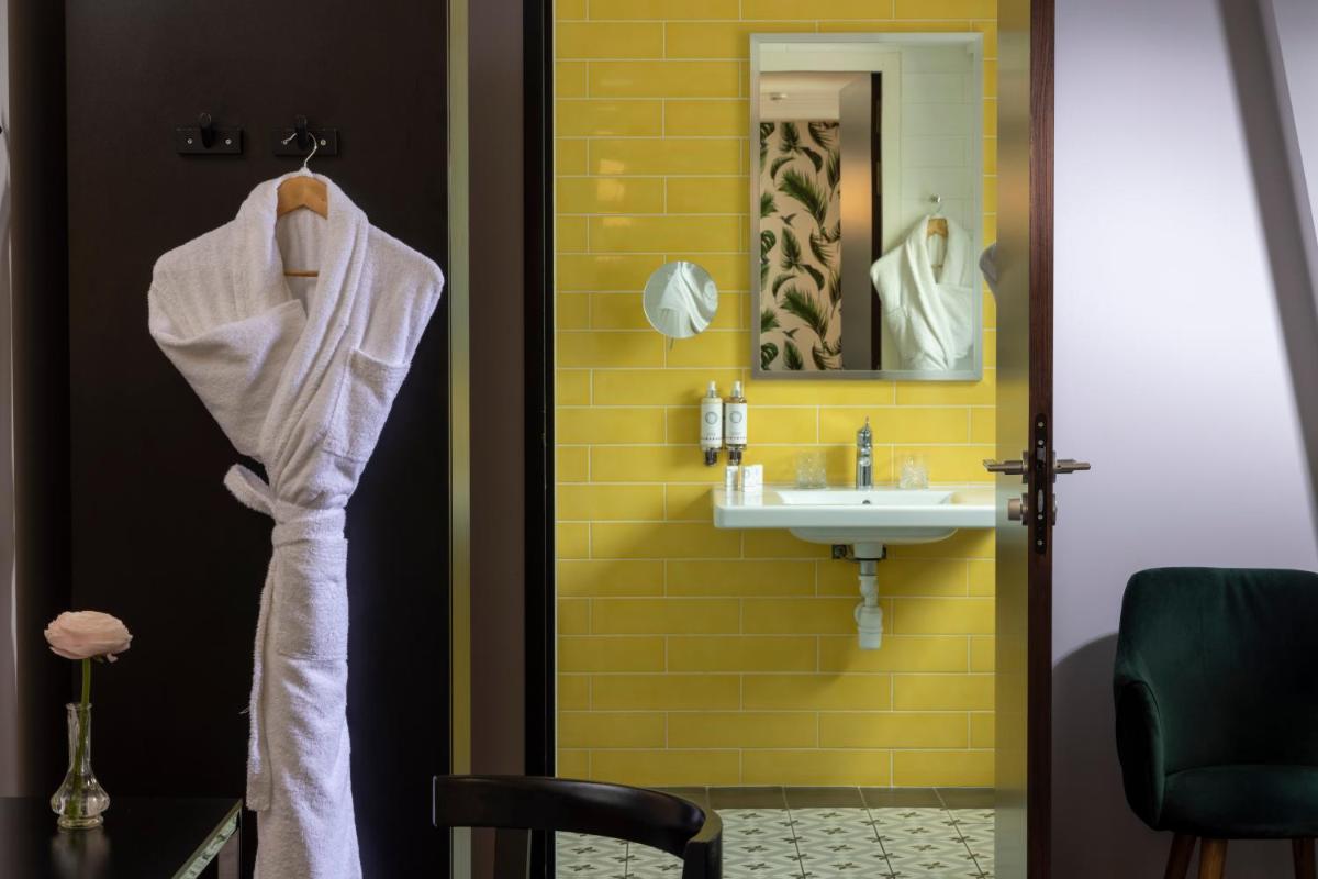 Salle de bains dans l'établissement Les Matins de Paris & Spa
