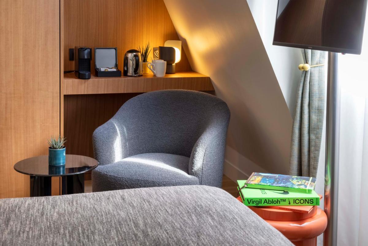 Coin salon dans l'établissement Hotel Le 37 Bis