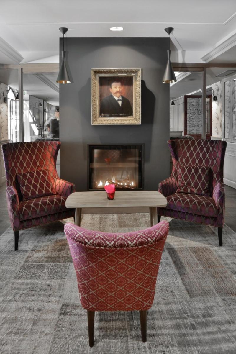 Coin salon dans l'établissement Les Glycines - Hôtel & Spa - Teritoria
