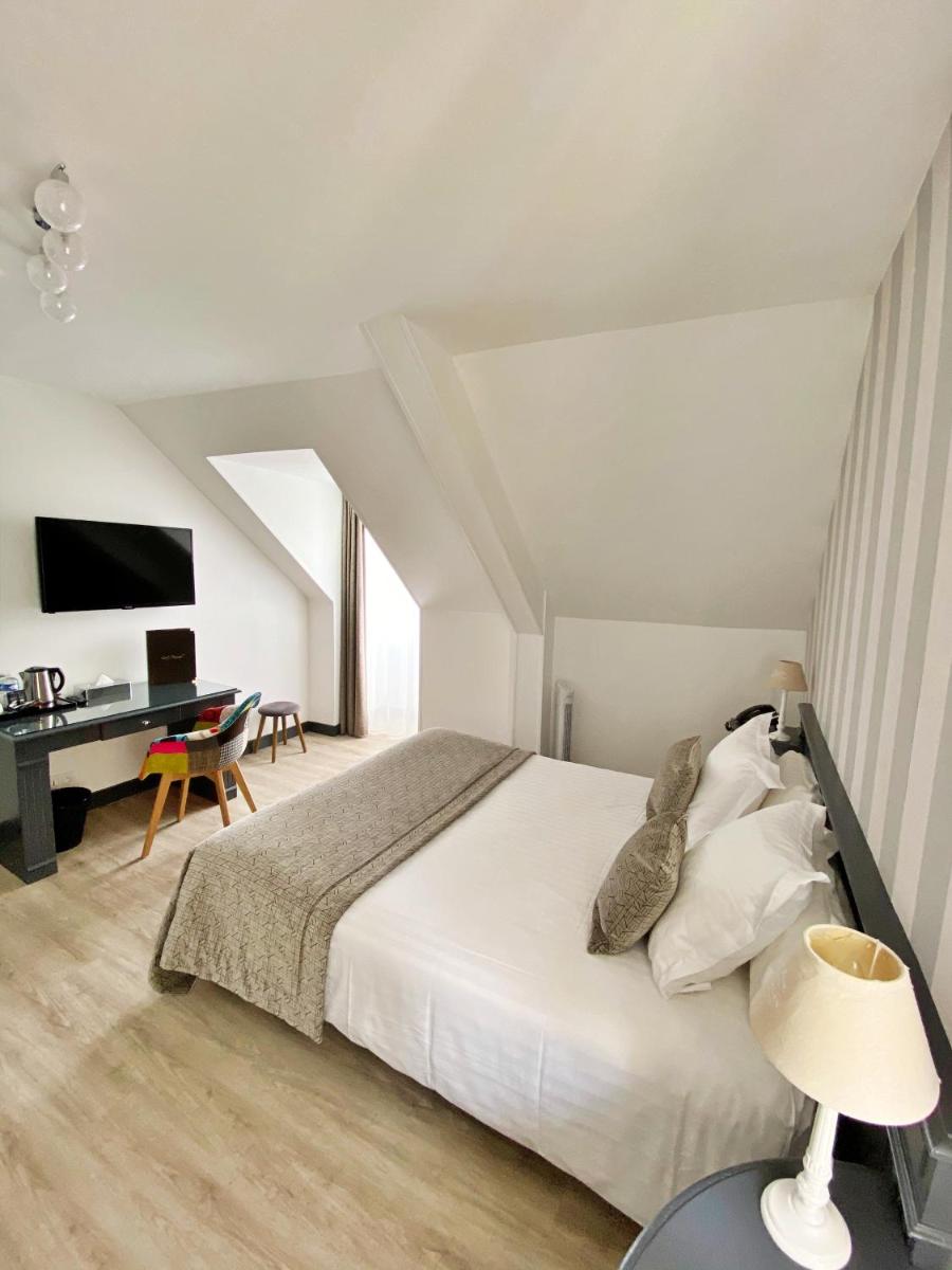 Un ou plusieurs lits dans un hébergement de l'établissement Grand Hôtel du Luxembourg & Spa