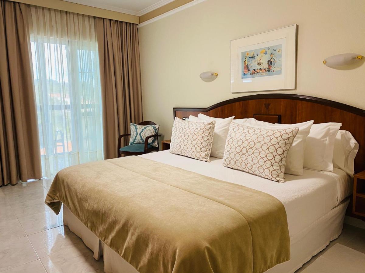 Cama o camas de una habitación en Nuevo Astur Spa