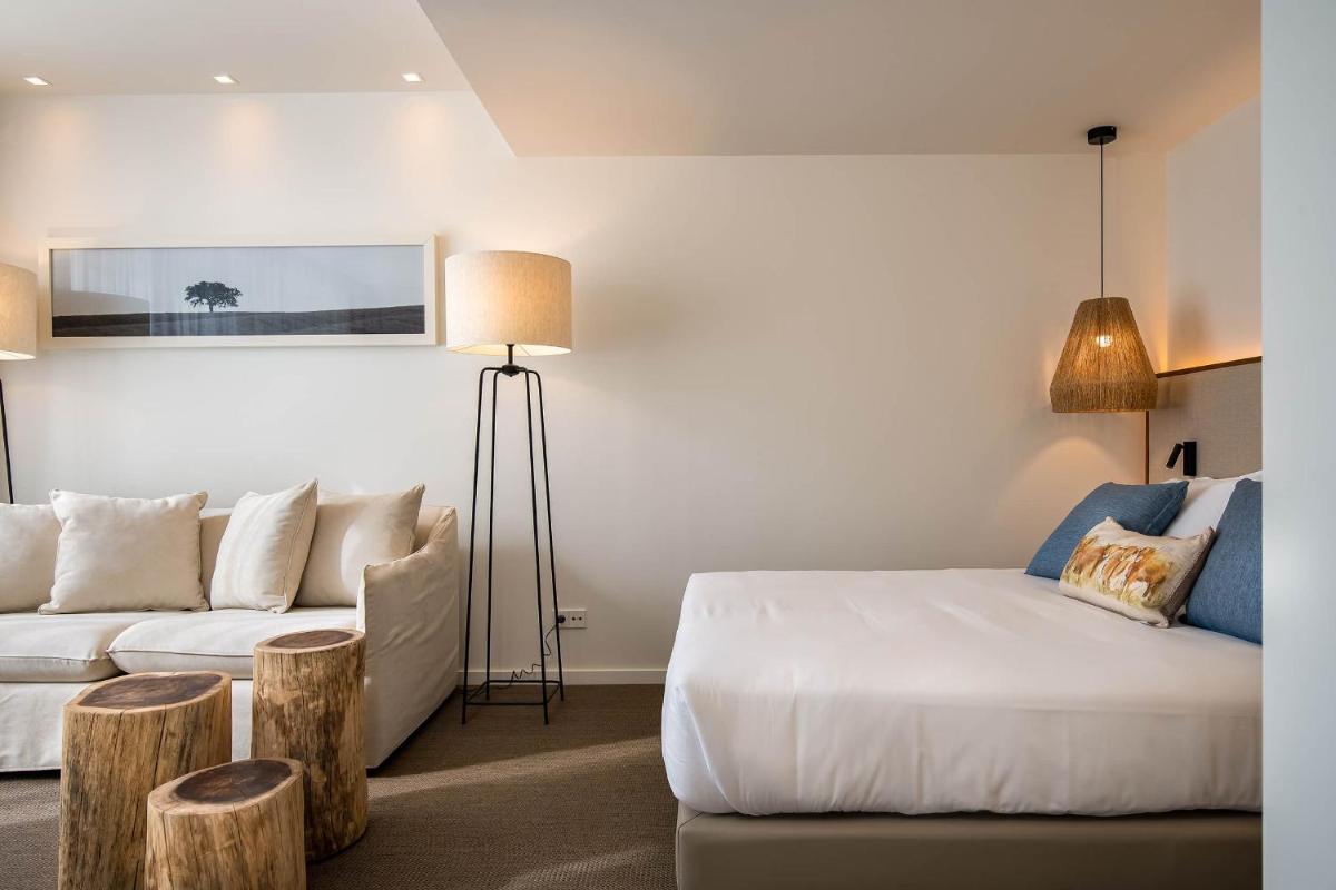 Uma cama ou camas num quarto em Octant Evora