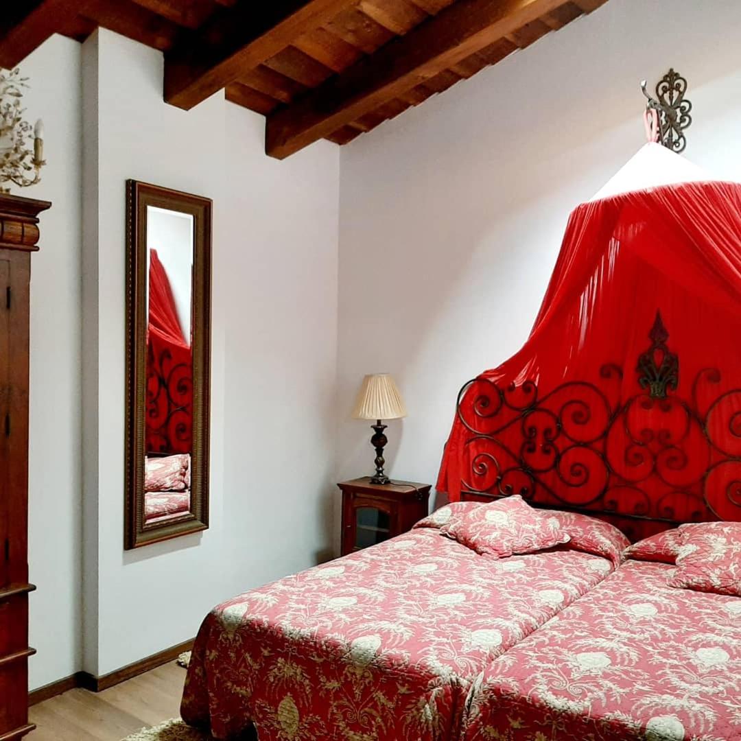 Cama o camas de una habitación en La Posada Del Canal