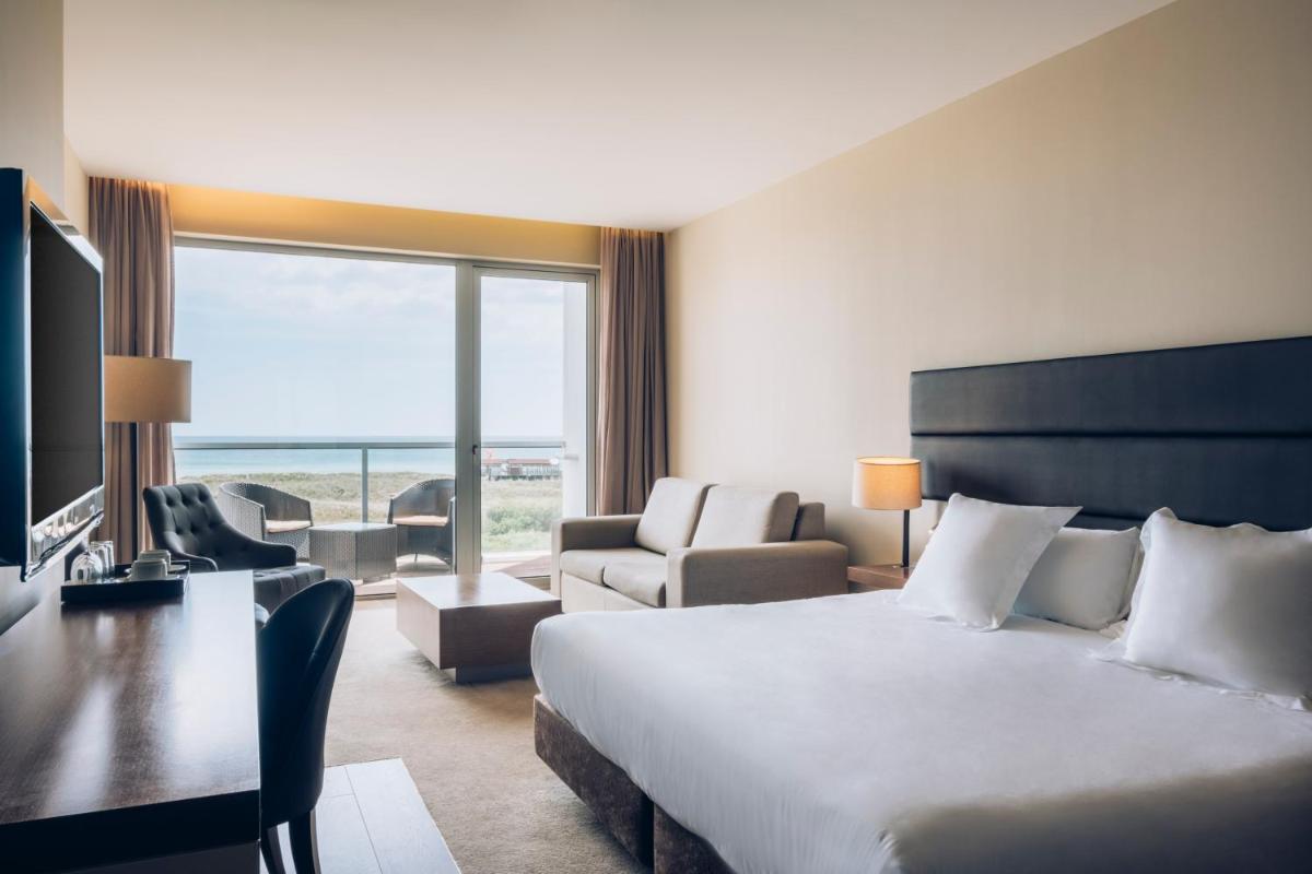 Uma cama ou camas num quarto em Iberostar Selection Lagos Algarve
