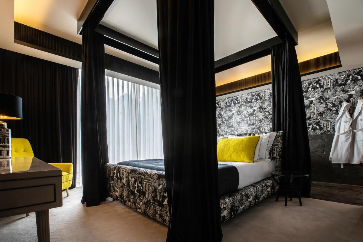Uma cama ou camas num quarto em Vinha Boutique Hotel - The Leading Hotels of the World