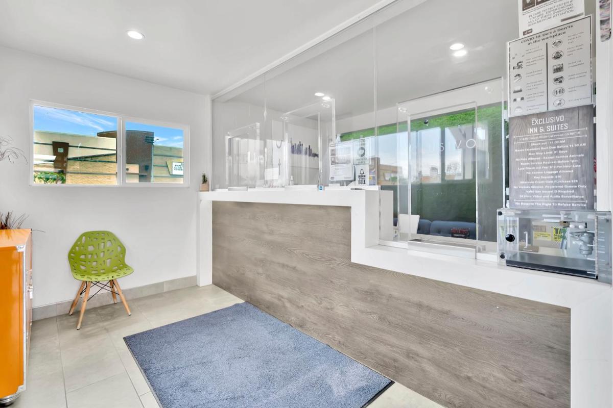 Exclusivo Inn and Suites - Housity