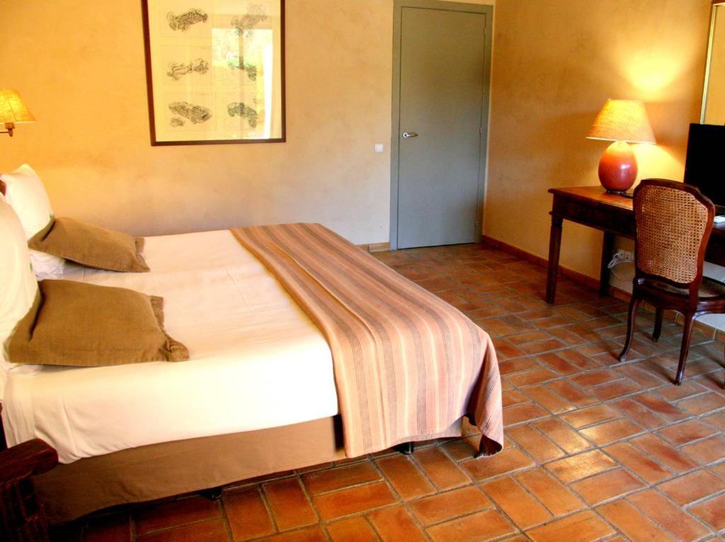 Cama o camas de una habitación en Mas Salvi Country Boutique Hotel