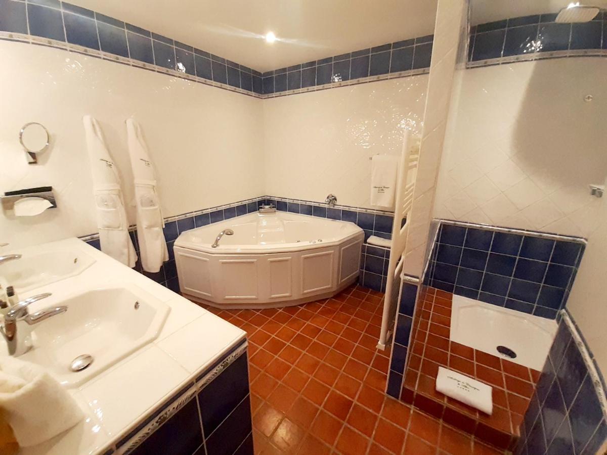 Salle de bains dans l'établissement Auberge de Cassagne & Spa