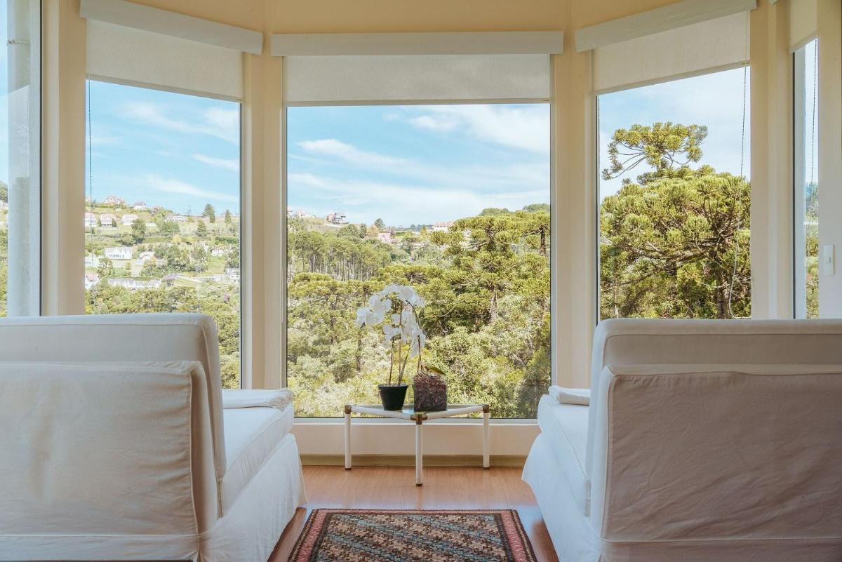 Casa com lareira, garagem e vista para montanhas - Housity
