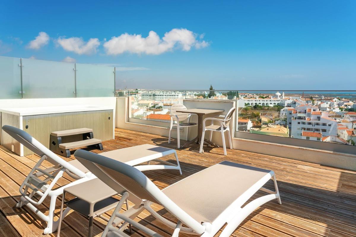 Uma varanda ou terraço em AP Maria Nova Lounge - Adults Friendly