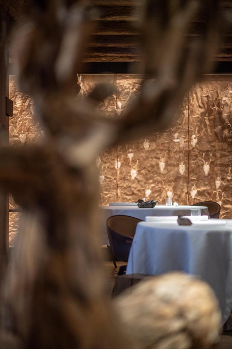 Restaurant ou autre lieu de restauration dans l'établissement Relais et Châteaux Le Chambard