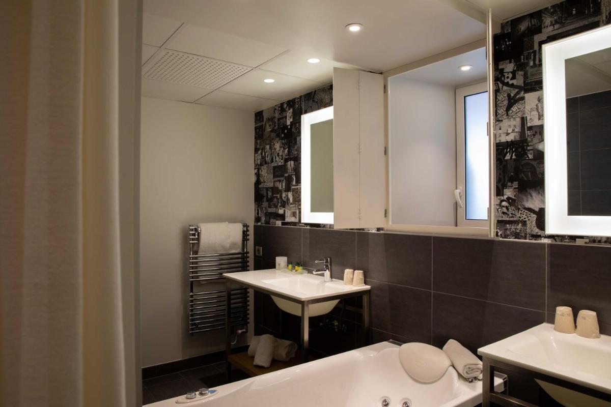 Salle de bains dans l'établissement Hôtel et Spa La Villa K - Basel Airport
