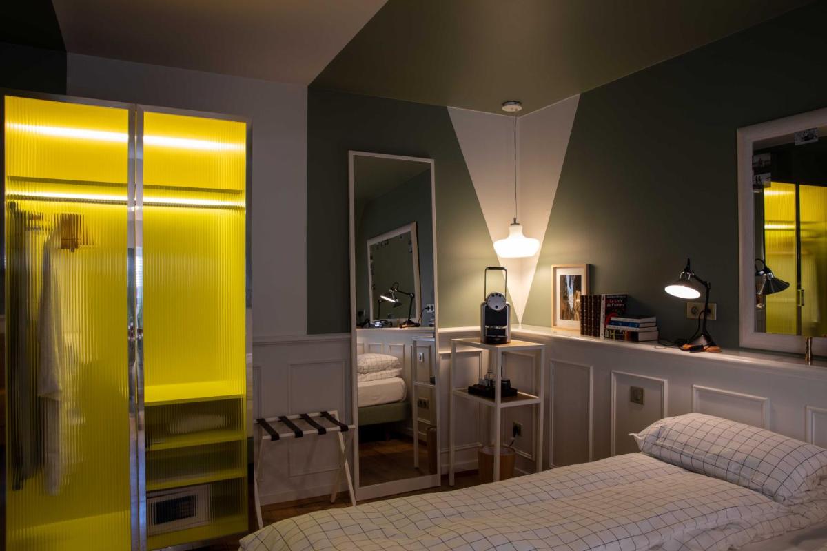 Un ou plusieurs lits dans un hébergement de l'établissement Hôtel et Spa La Villa K - Basel Airport
