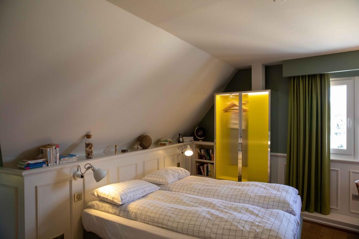 Un ou plusieurs lits dans un hébergement de l'établissement Hôtel et Spa La Villa K - Basel Airport