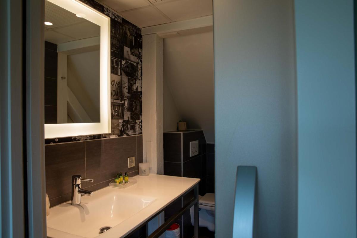 Salle de bains dans l'établissement Hôtel et Spa La Villa K - Basel Airport