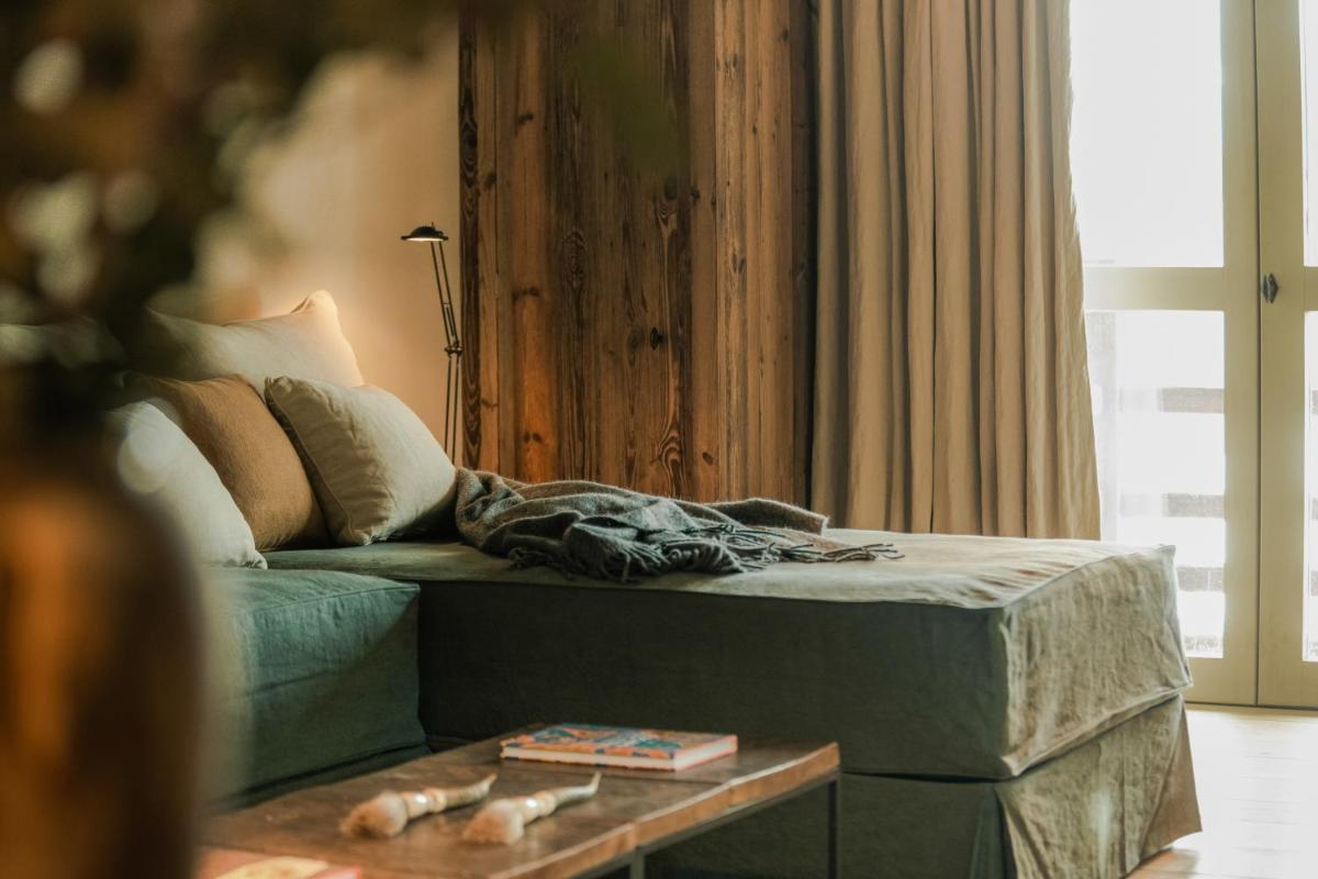Coin salon dans l'établissement Zannier Le Chalet
