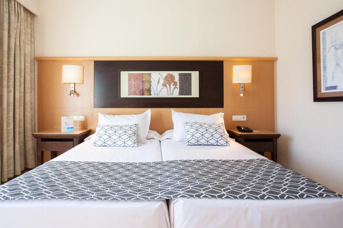 Cama o camas de una habitación en Grupotel Nilo & Spa