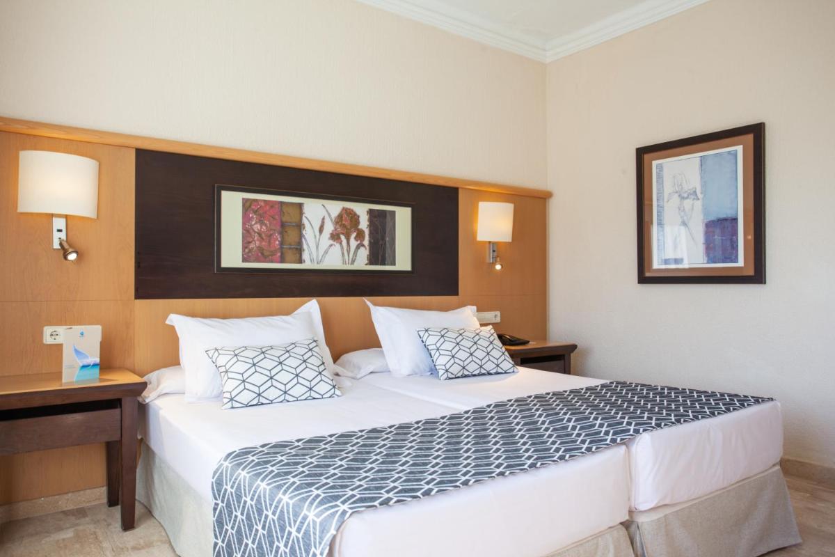 Cama o camas de una habitación en Grupotel Nilo & Spa