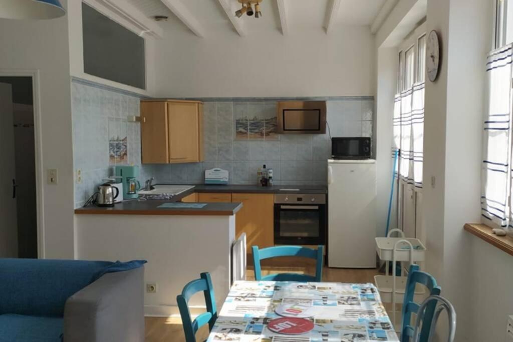12 RDC Appartement 2 chambres jardin terrasse - Housity