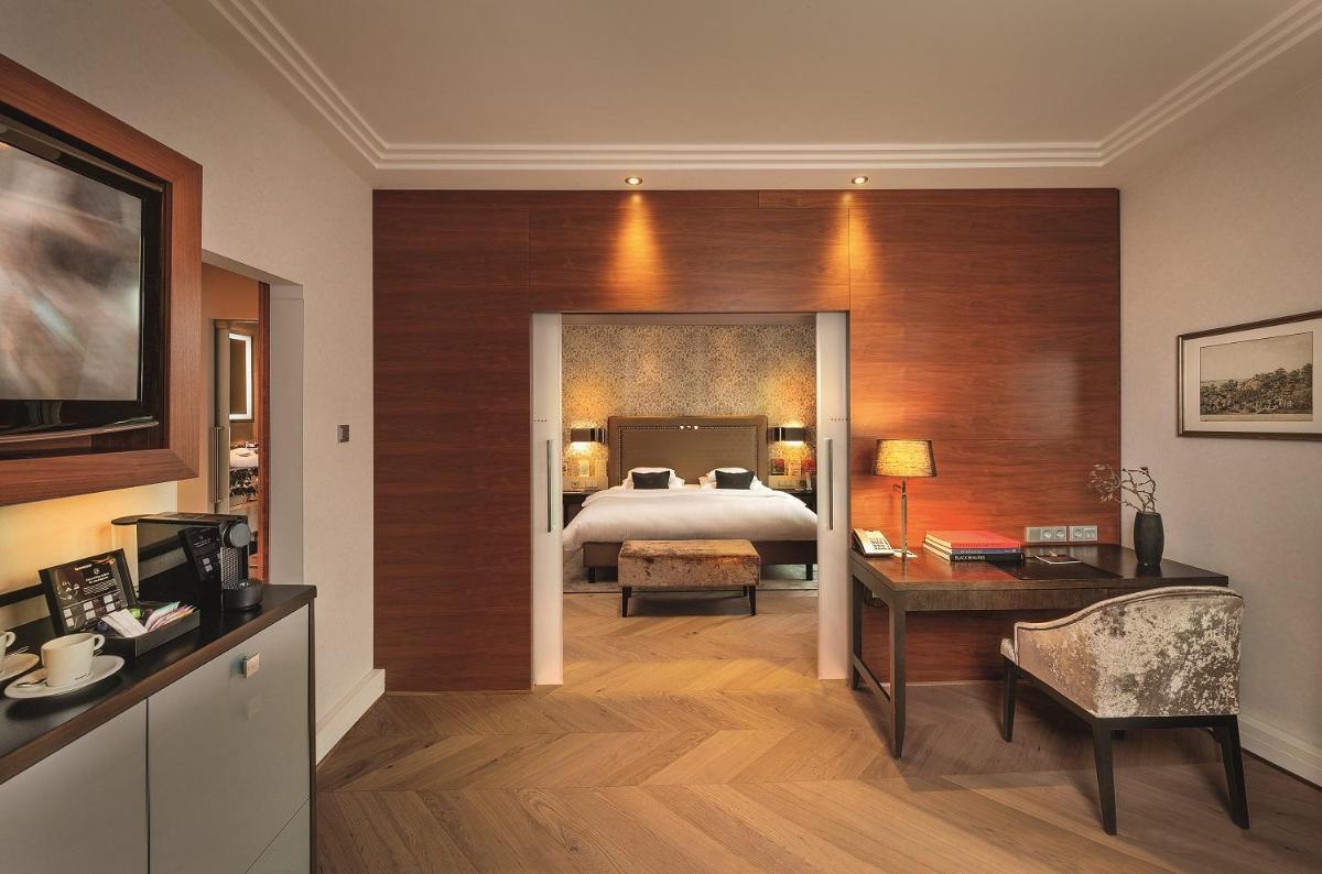 Ein Bett oder Betten in einem Zimmer der Unterkunft Hotel Maximilian’s