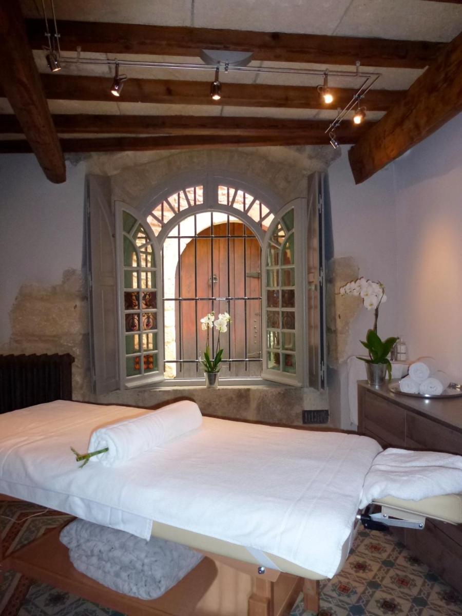 Un ou plusieurs lits dans un hébergement de l'établissement Le Castellas Hotel & SPA - TERITORIA