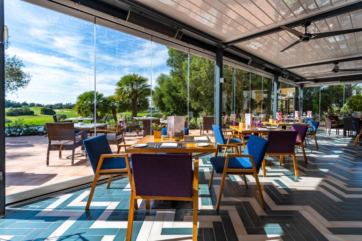 Un restaurante o sitio para comer en Barceló Montecastillo Golf