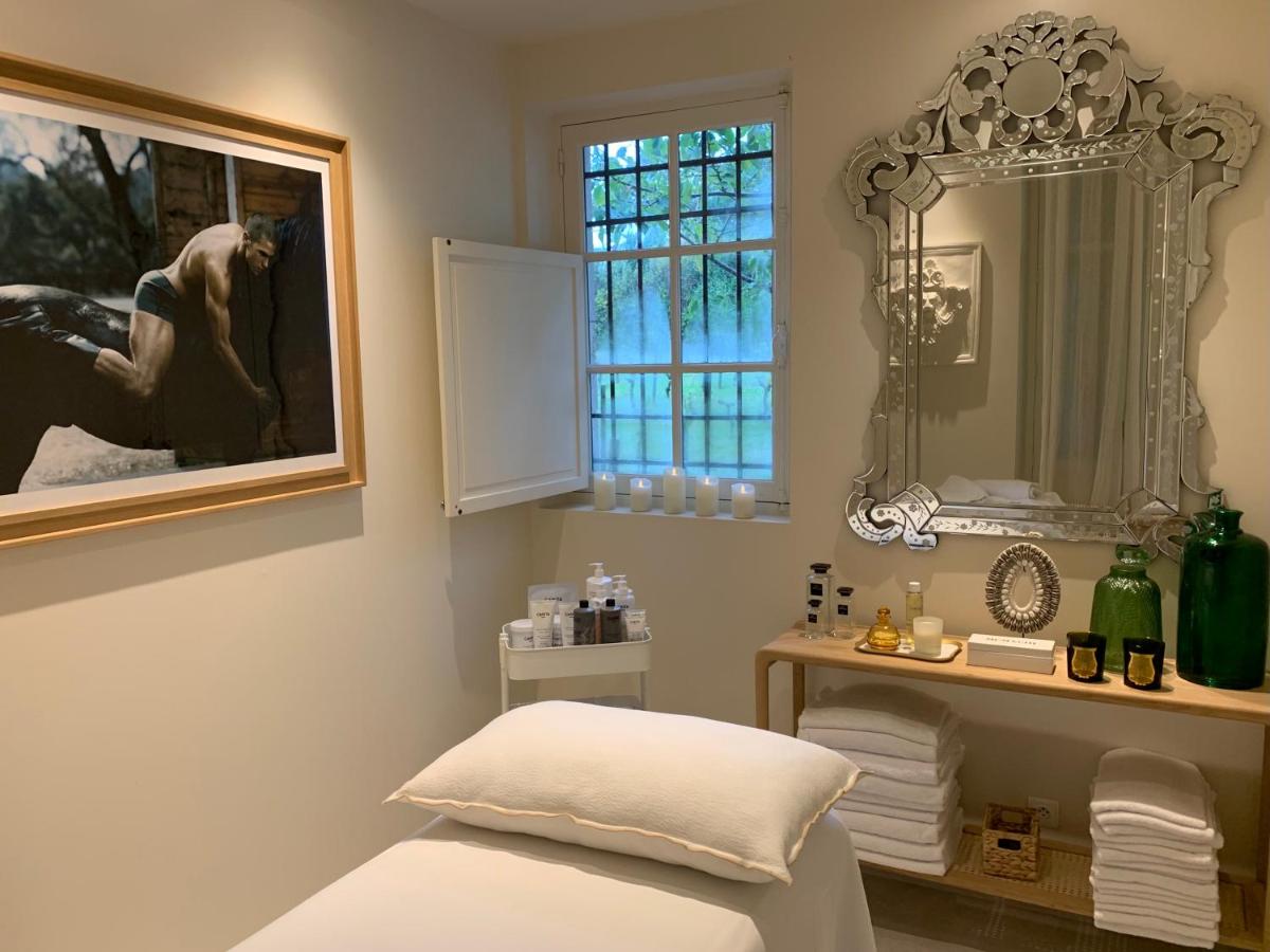Un ou plusieurs lits dans un hébergement de l'établissement Beaumanoir Small Luxury Boutique Hotel