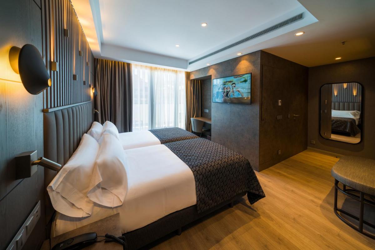 Cama o camas de una habitación en Catalonia Gran Vía Bilbao