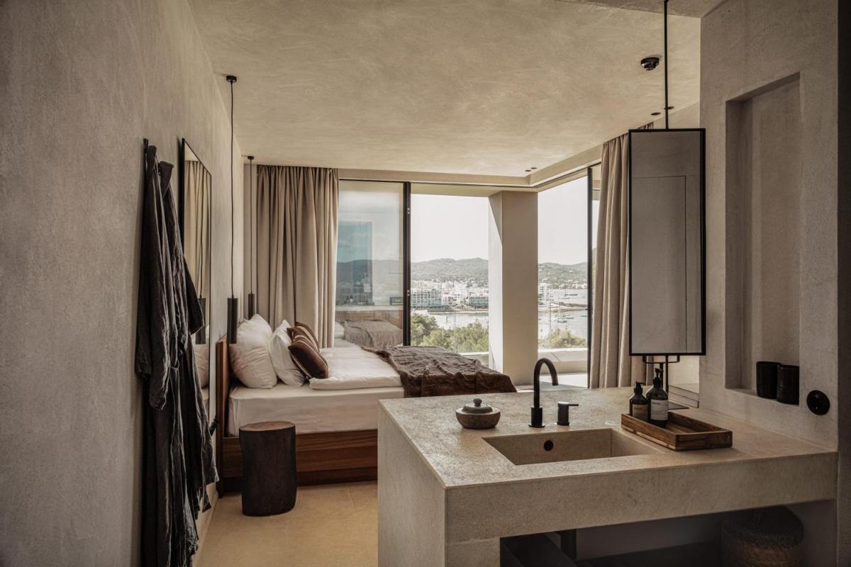 Cama o camas de una habitación en OKU Ibiza