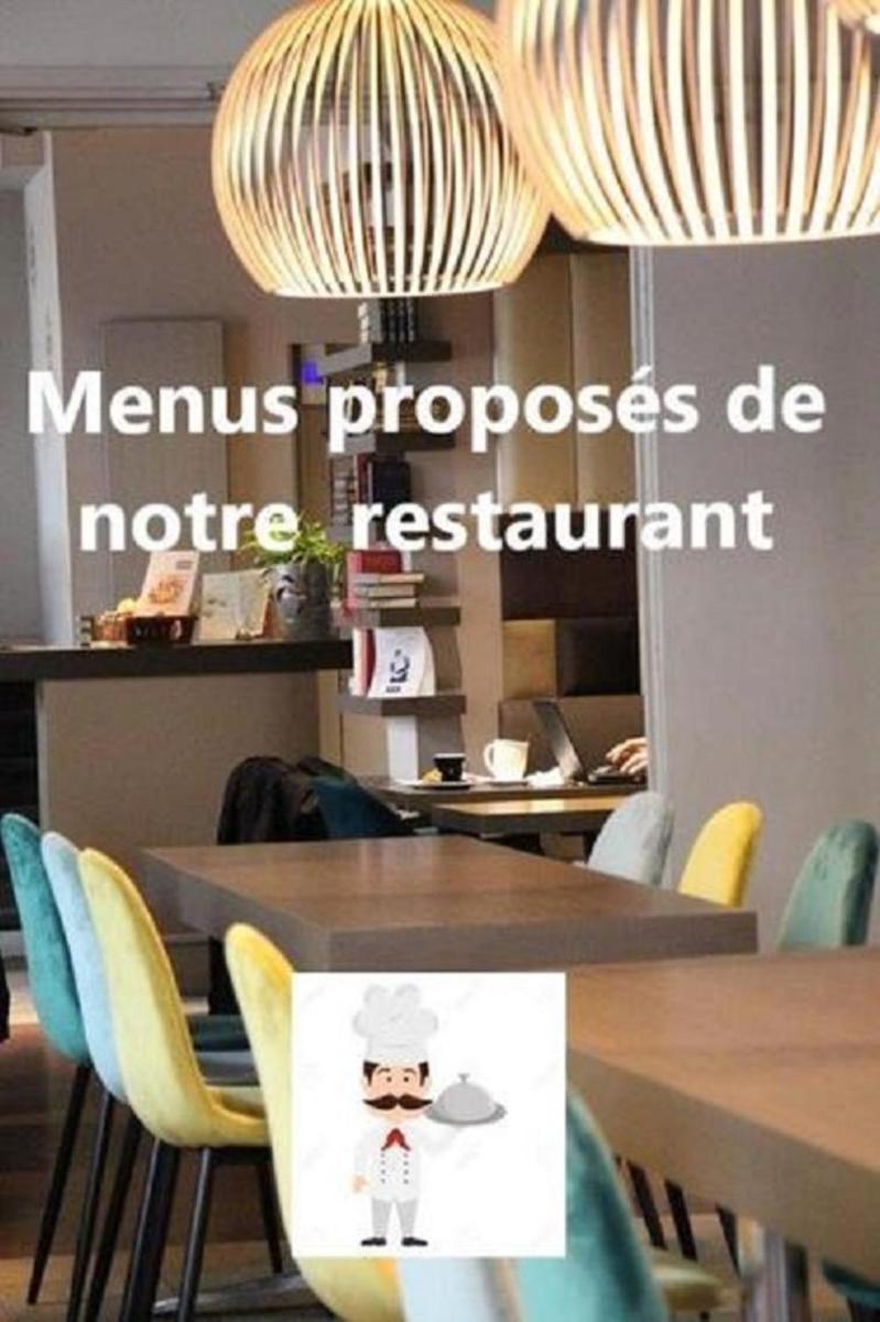 Restaurant ou autre lieu de restauration dans l'établissement Kyriad Restaurant Centre SPA Vichy