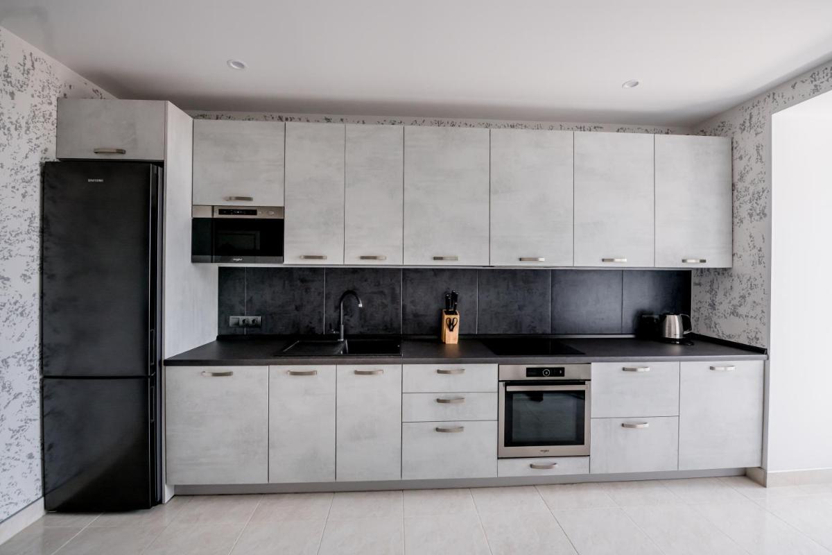 Апартаменти OneDay в ценрі Чорткова - Housity